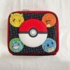 Top view of the lunch bag with Pikachu, Charmander, Bulbasaur and Squirtle around a Poké Ball